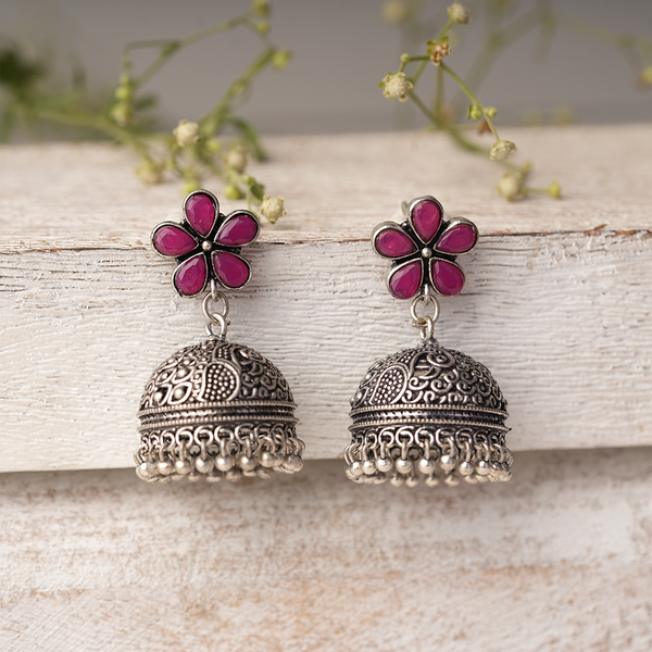 Champika- Silver Brass Stone Studded Jhumka Earrings(Red)