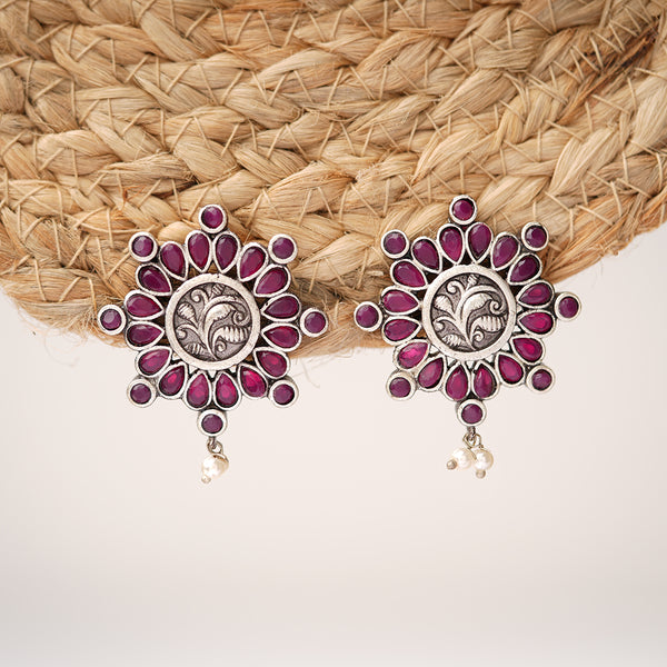 Floral shaped authentic Silver alloy studs embedded with Ruby like stones