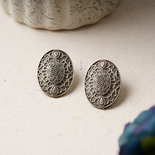 Silver toned handcrafted brass stud earrings