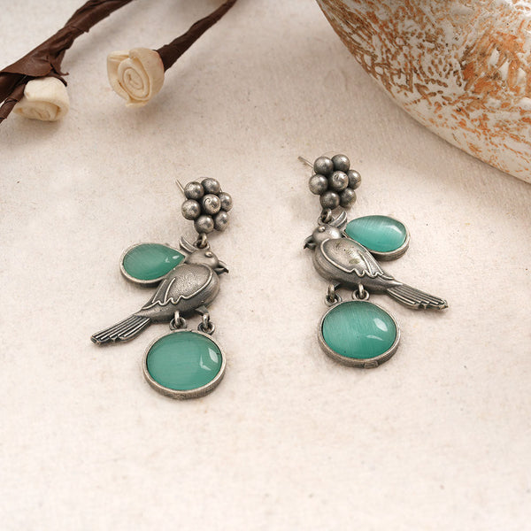 Shakuntika- Silver brass oxidised stone studded dangler earrings