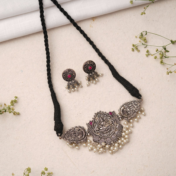 Red Stone studded Laxmi Motif German Silver Neckpiece set