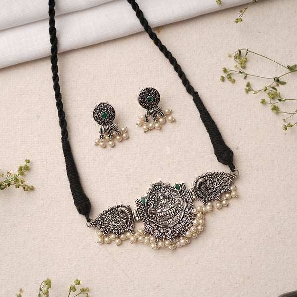 Green Stone studded Laxmi Motif German Silver Neckpiece set