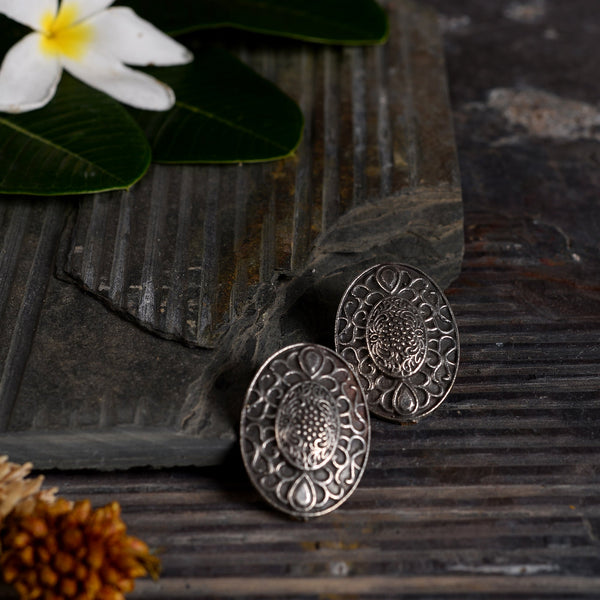 Silver toned handcrafted brass stud earrings