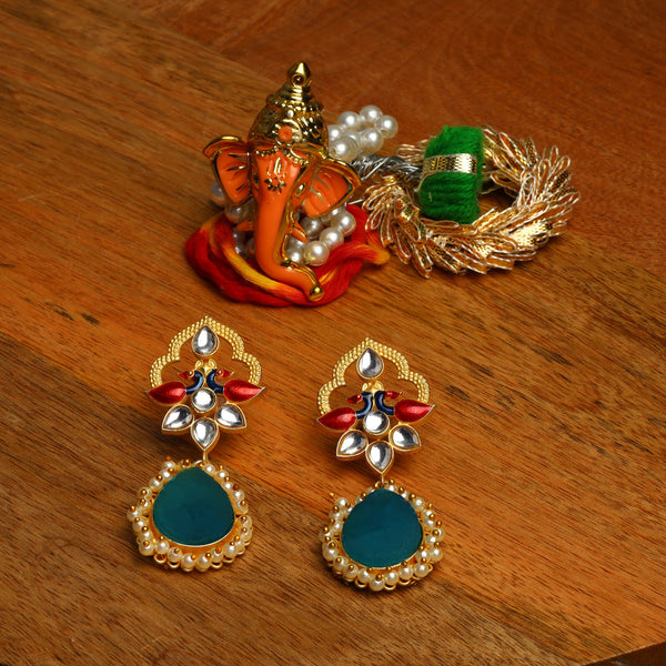 Natural stone and Kundan studded Peacock embellished brass Danglers with hanging Baby Pearls